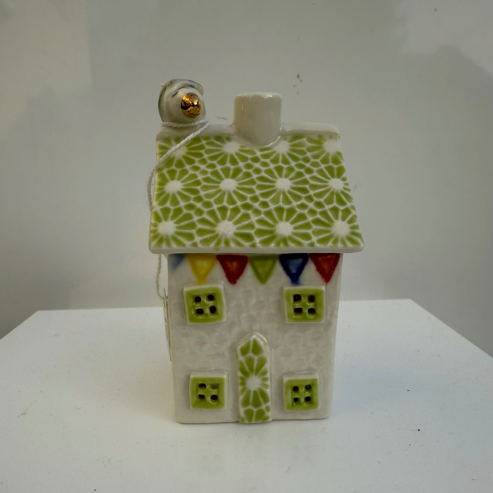 Small porcelain tea-light house, original daisies, pea green