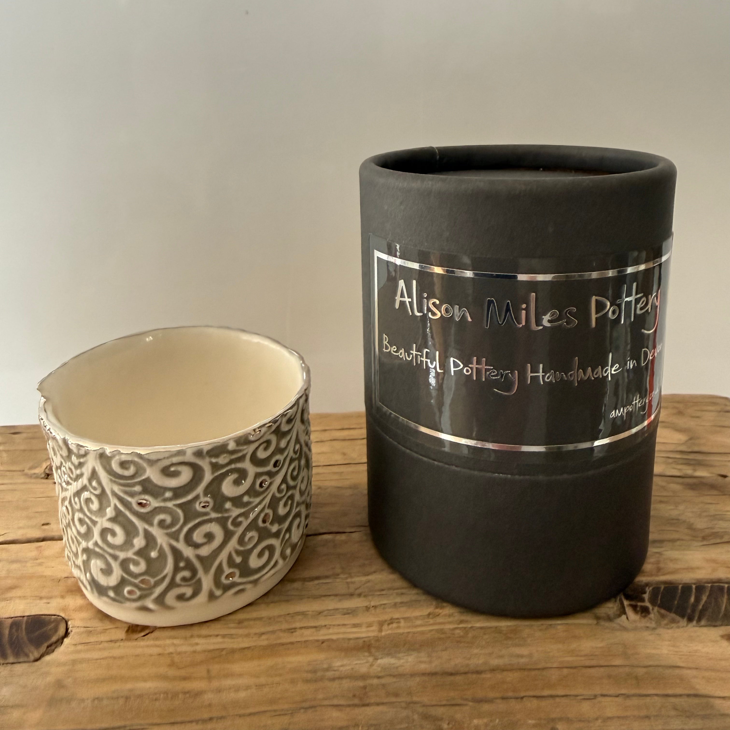 Porcelain tea-light holder, swirls, taupe (grey) with platinum detail