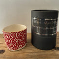 Porcelain tea-light holder, swirls, cherry red with gold detail