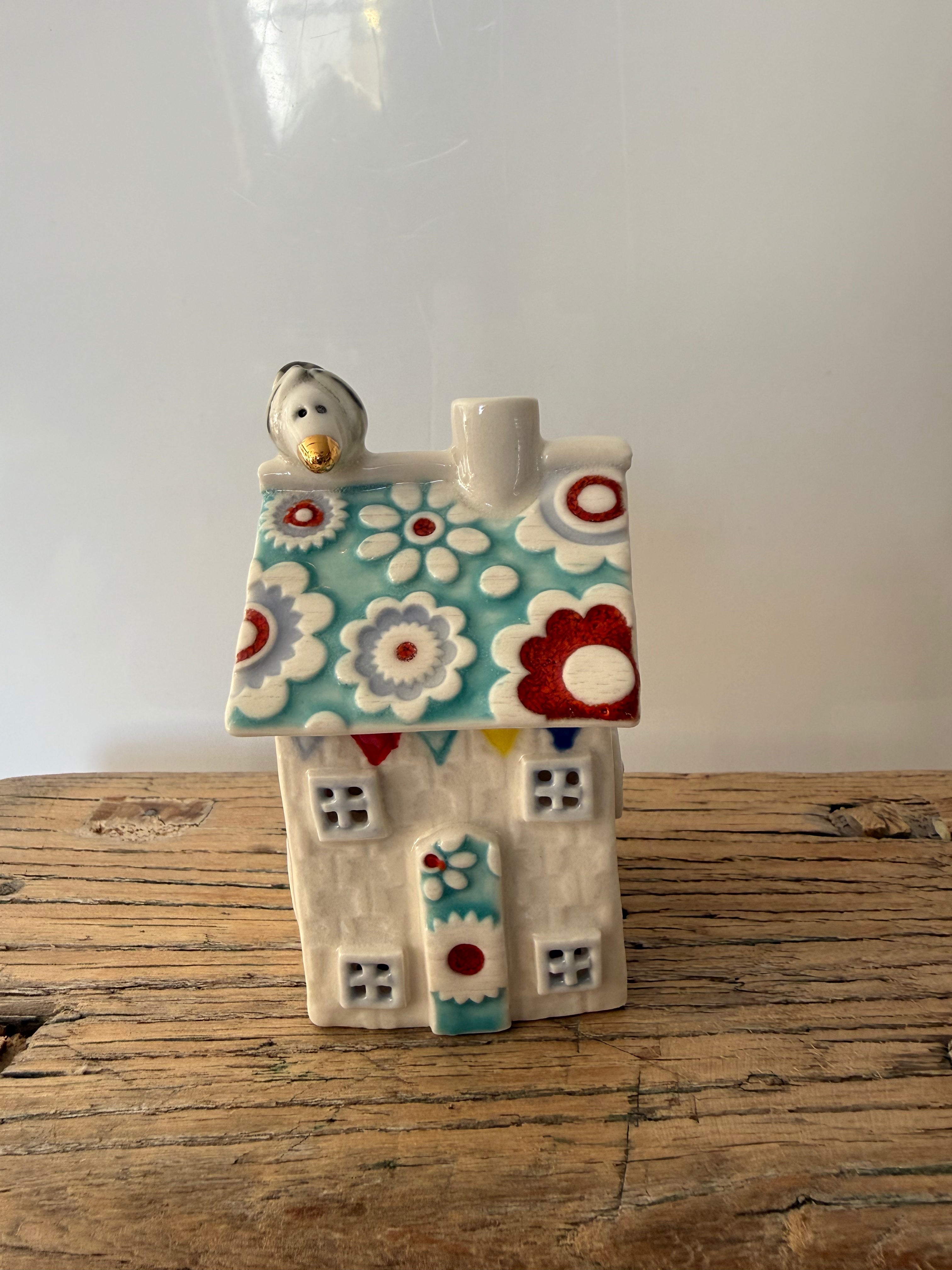 Small porcelain tea-light house, original flowers, turquoise, pastel and red with gold detail