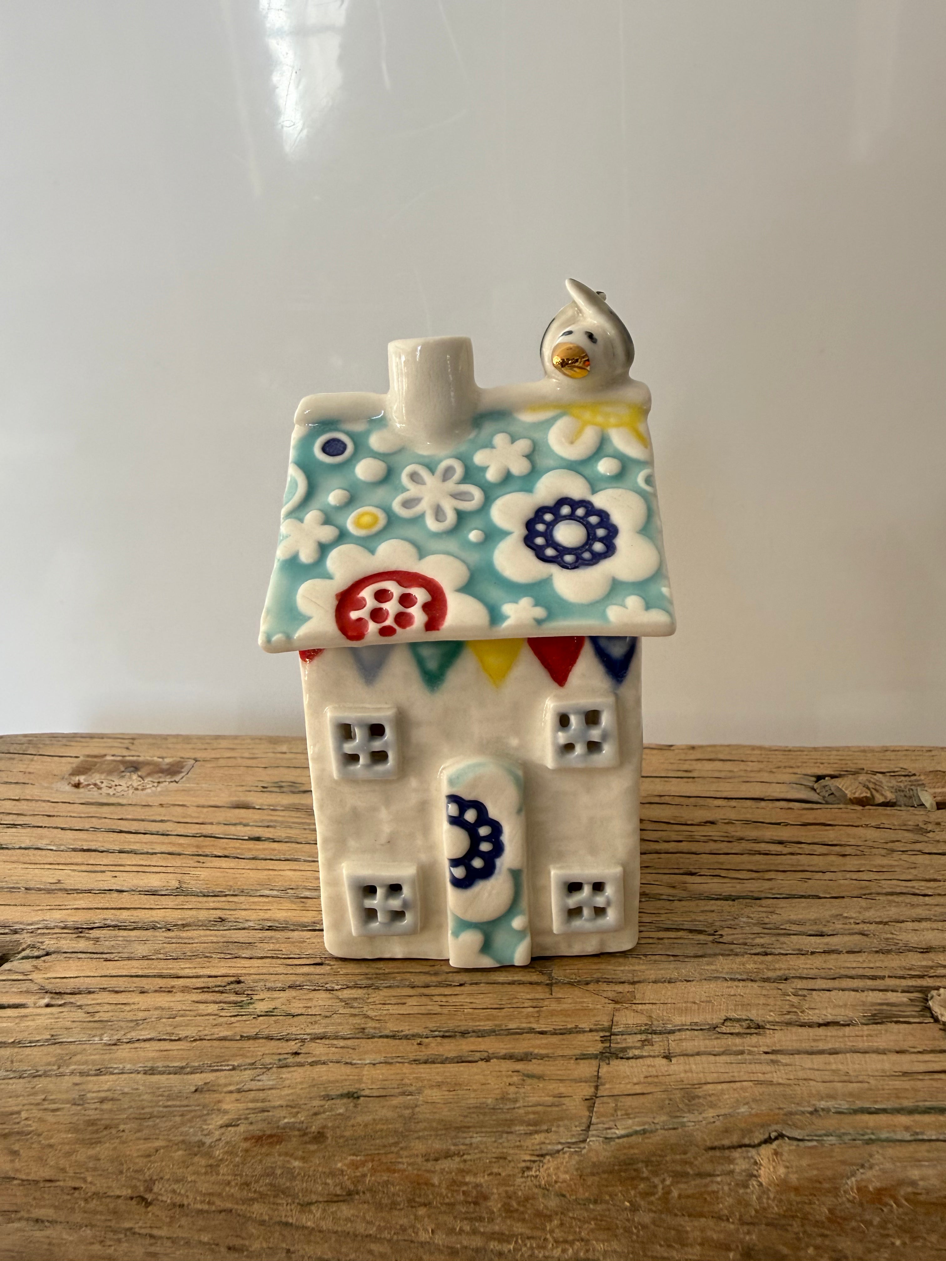 Small porcelain tea-light house, flowers, turquoise with multi-colour and gold detail