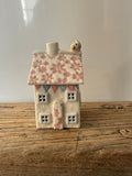 Small porcelain tea-light house, daisies 1, pink with pastel and gold detail